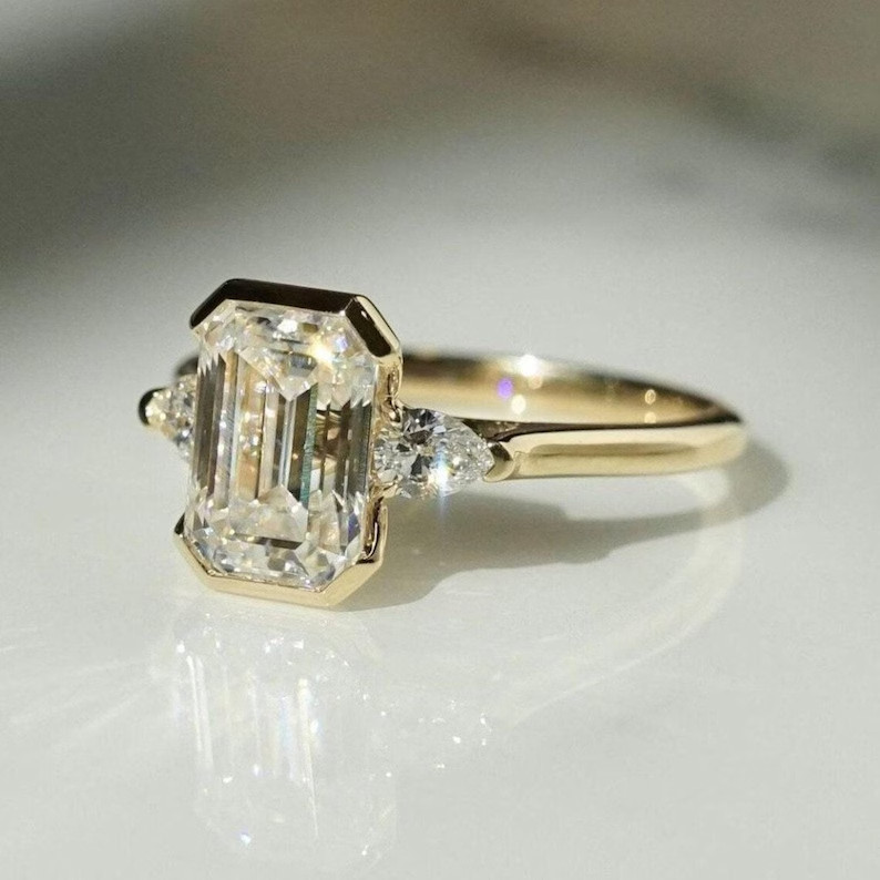 3Ct Emerald Cut VVSI Genuine Moissanite Three Stone Ring 14K Yellow Gold Plated